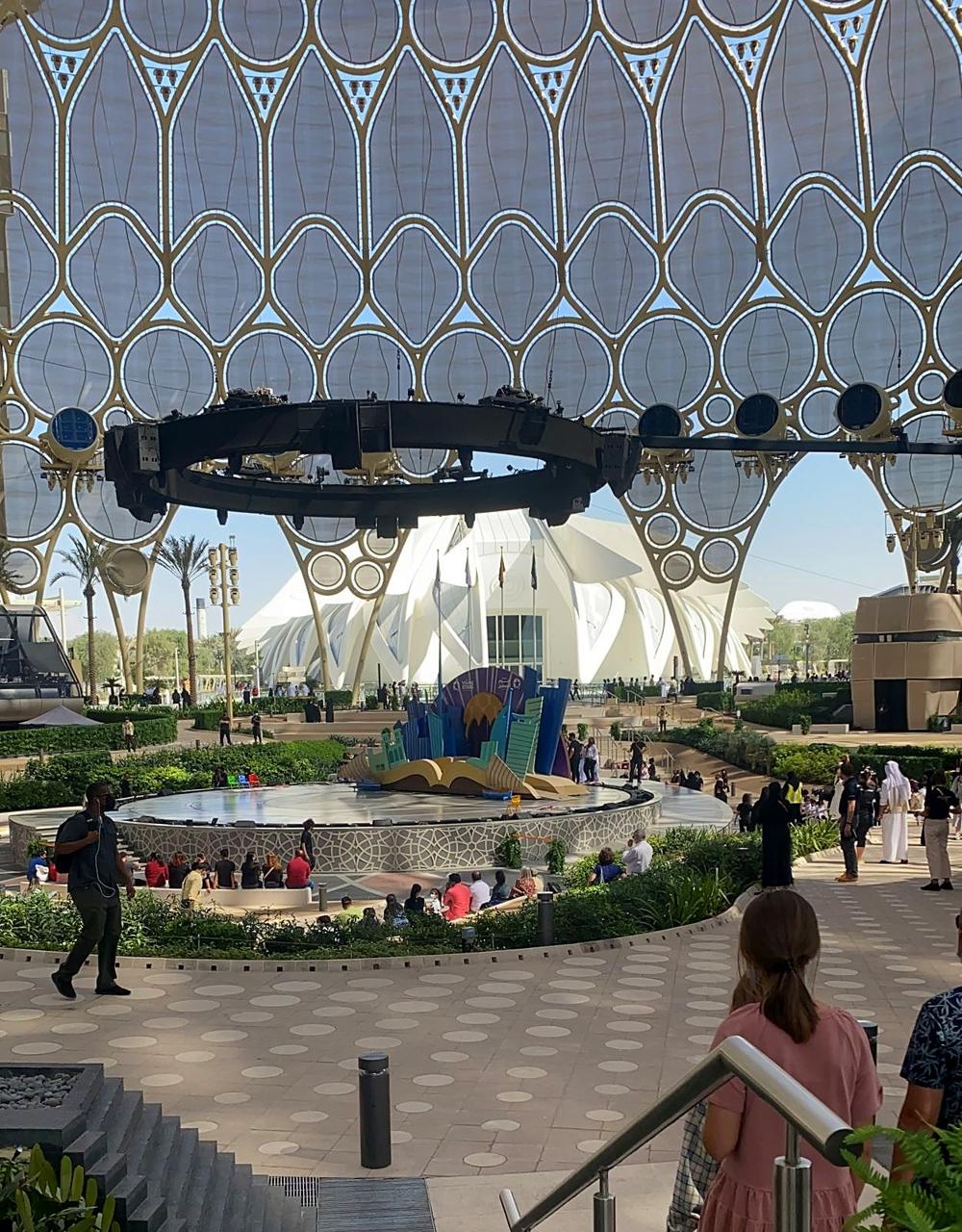 Families gathering at the stage beneath the Al Wasl dome at Expo 2020 Dubai.